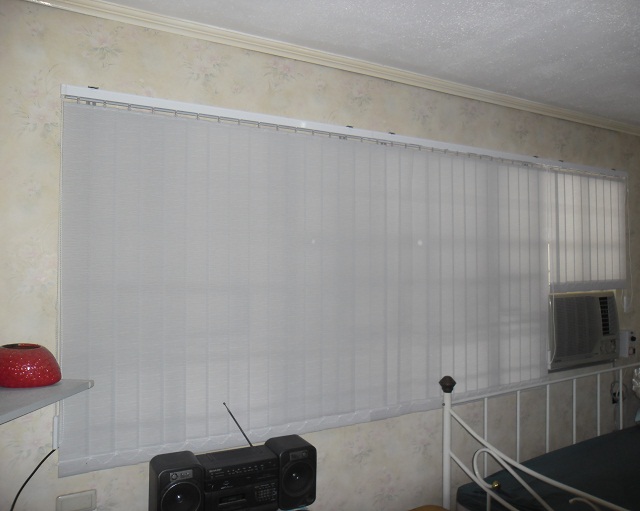 Fabric Vertical Blinds Installed at his Bedroom