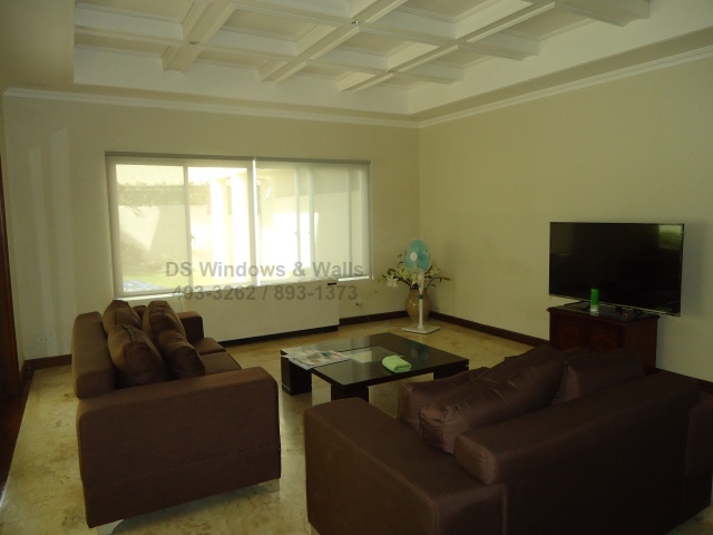 spacious-living-room-white-roller-shades