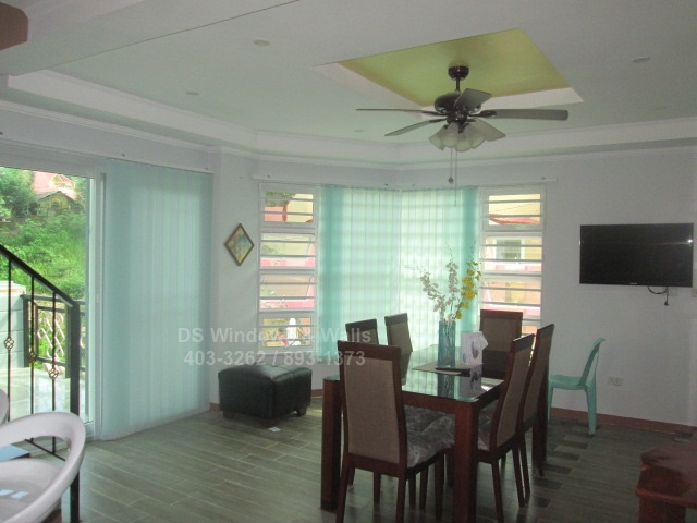 Fabric blinds townhouse dining area