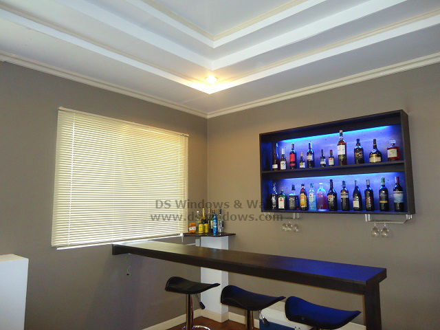 venetian blinds featured at living room mini bar: makati city