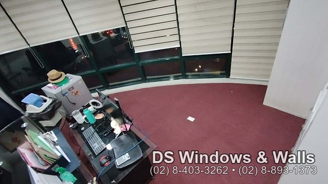 carpet roll finished around an office window bay in Manila