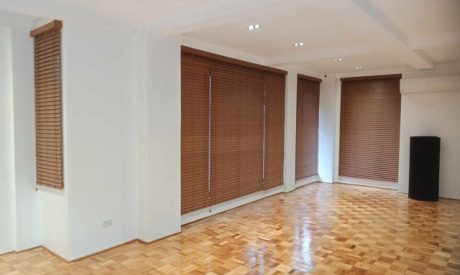 Brown faux wood blinds in a Makati home