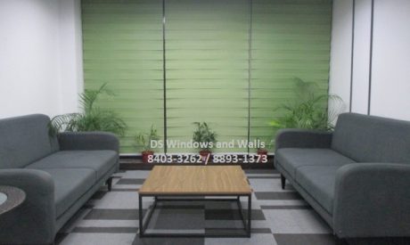 Green combi blinds in an office lounge